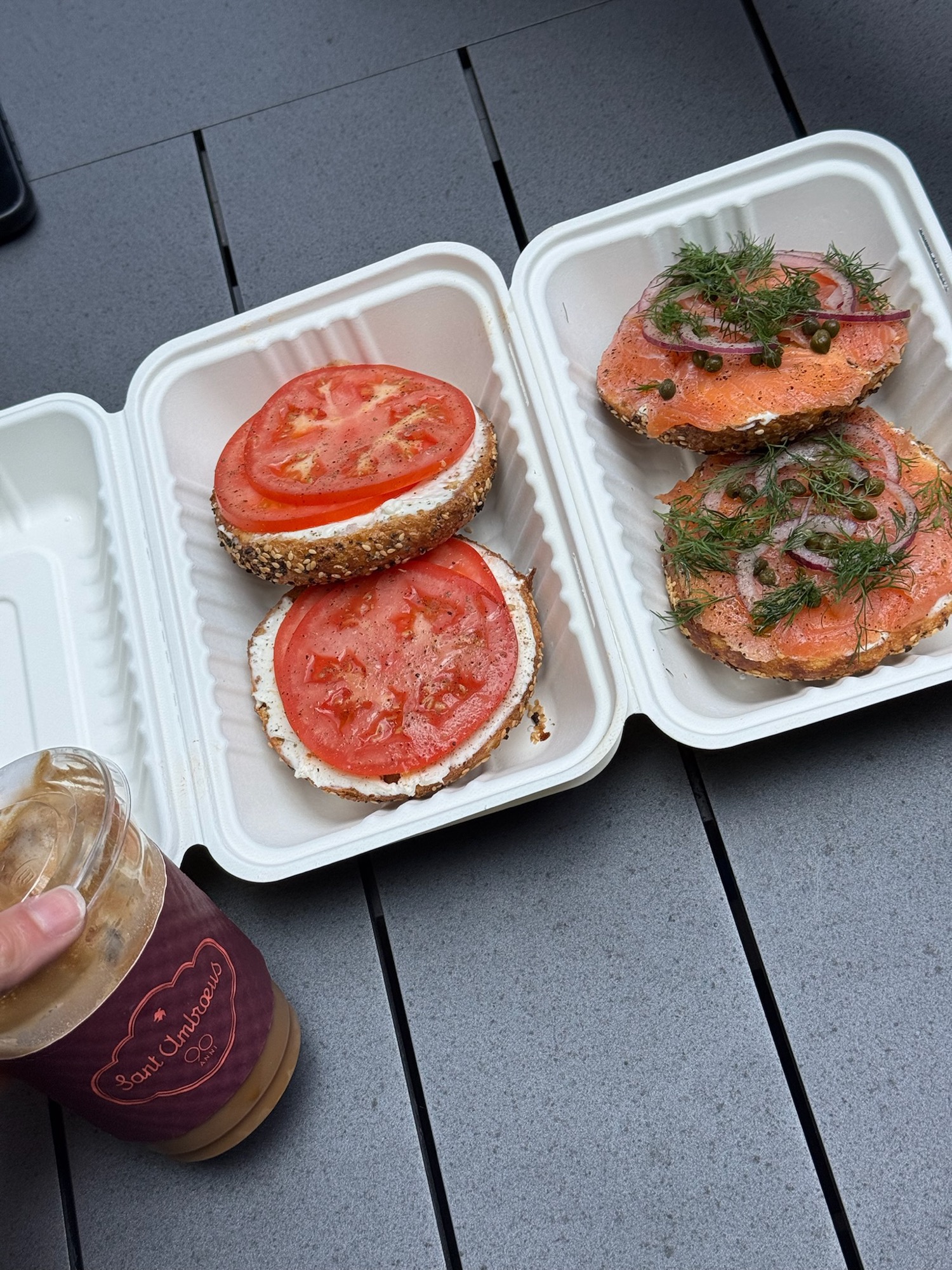 Bagel sandwiches and smoked salmon takeout with a Sant Ambroeus coffee cup