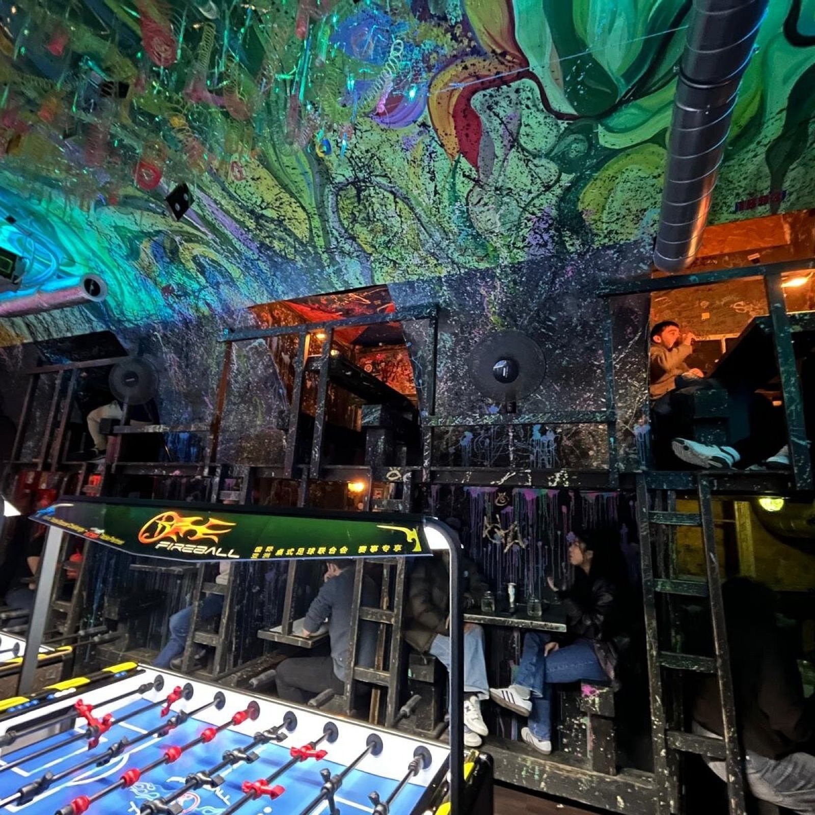 Foosball tables and a neon-lit cocktail bar